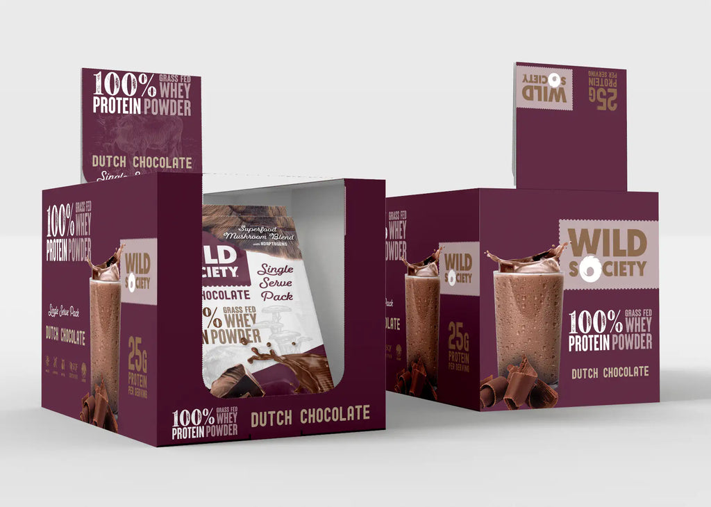 Wild Society protein powder boxes on a white background